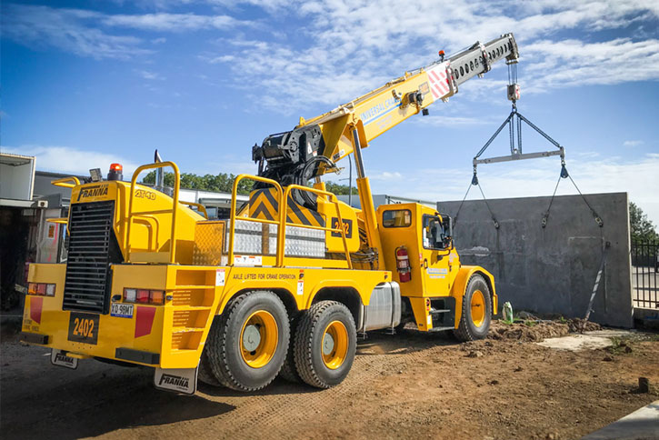 Crane Truck with Driver Delivers Materials Anywhere Fast